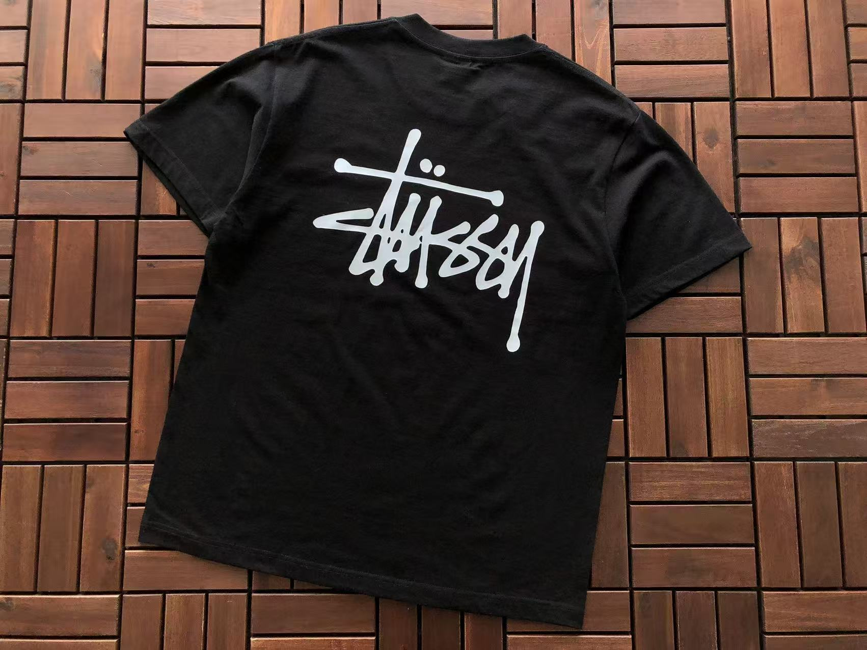 Stüssy black tee back